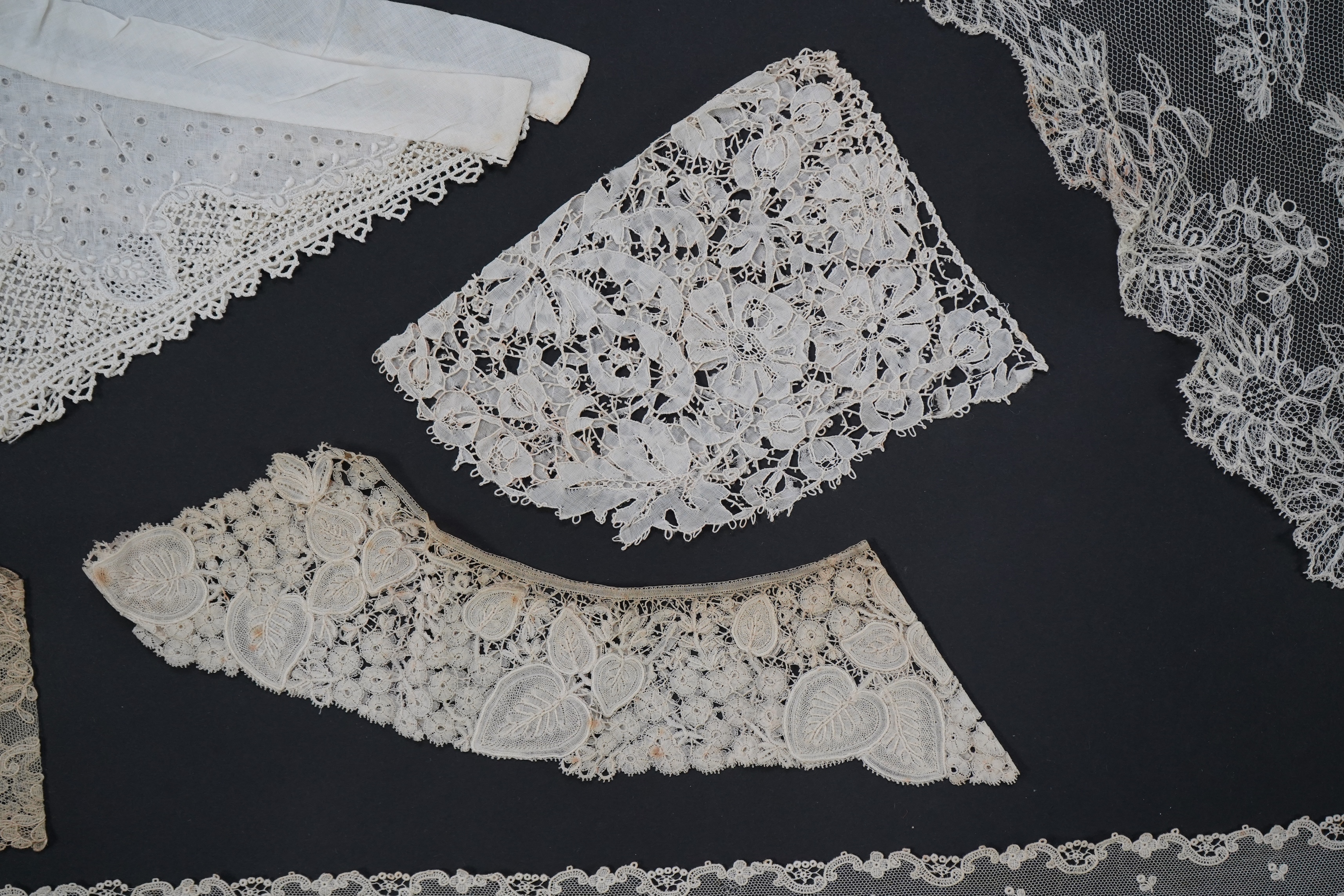 A variety of 19th and 20th century cream lace, being mixed hand and machine collars, lappets, trimmings together with a silk stole. Ideal for tv, film and theatre, stole 230 cm long. Condition - good